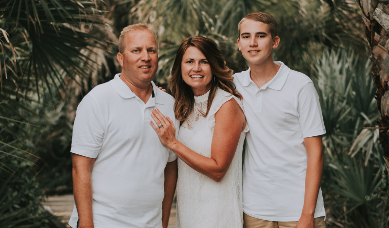 Bo Rowe with his wife and son