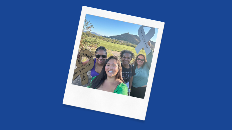Four women pose with their white ribbons.